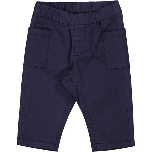 Navy blue baby pants with an elastic waistband for a comfortable fit. Features two side pockets and stitched detailing for a structured look. Made from soft, durable fabric, perfect for everyday wear.