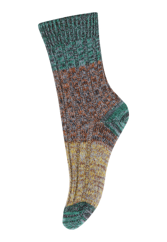 Wool socks made from lrft over yarn